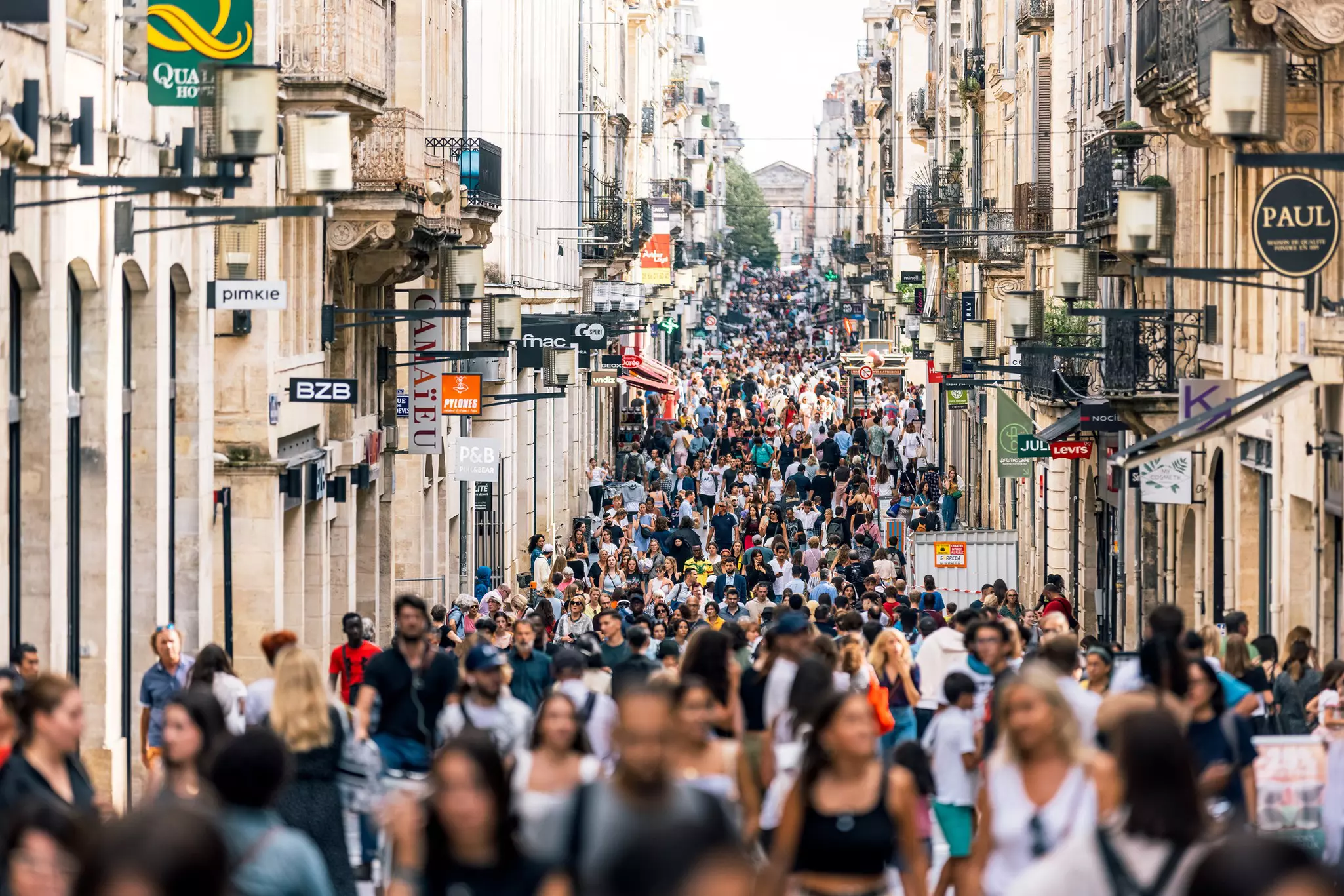 Crowds of people on rue Sainte-Catherine shopping street in Bordeaux, France