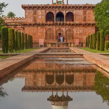 Taj Mahal, Agra.  1631-1653. Taj Mahal Museum. Chatri on roof. Red sandstone mosque and reflecting pool in grounds of Taj Mahal.