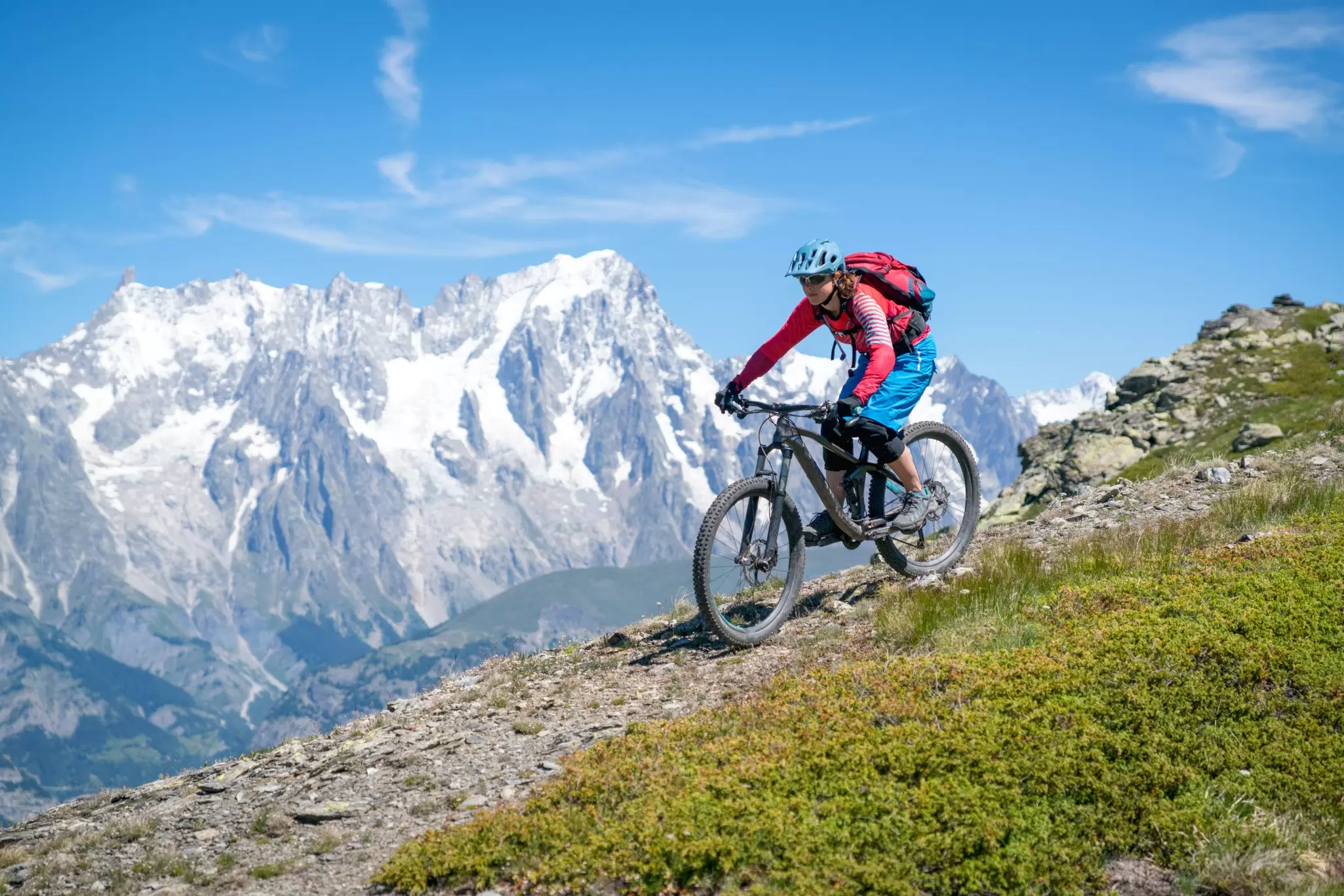 You’ll bike up and around the Alps and through three countries on the Tour du Mont Blanc. Getty Images