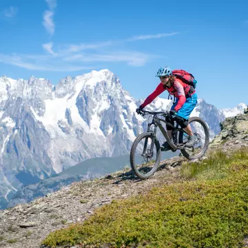 You’ll bike up and around the Alps and through three countries on the Tour du Mont Blanc. Getty Images