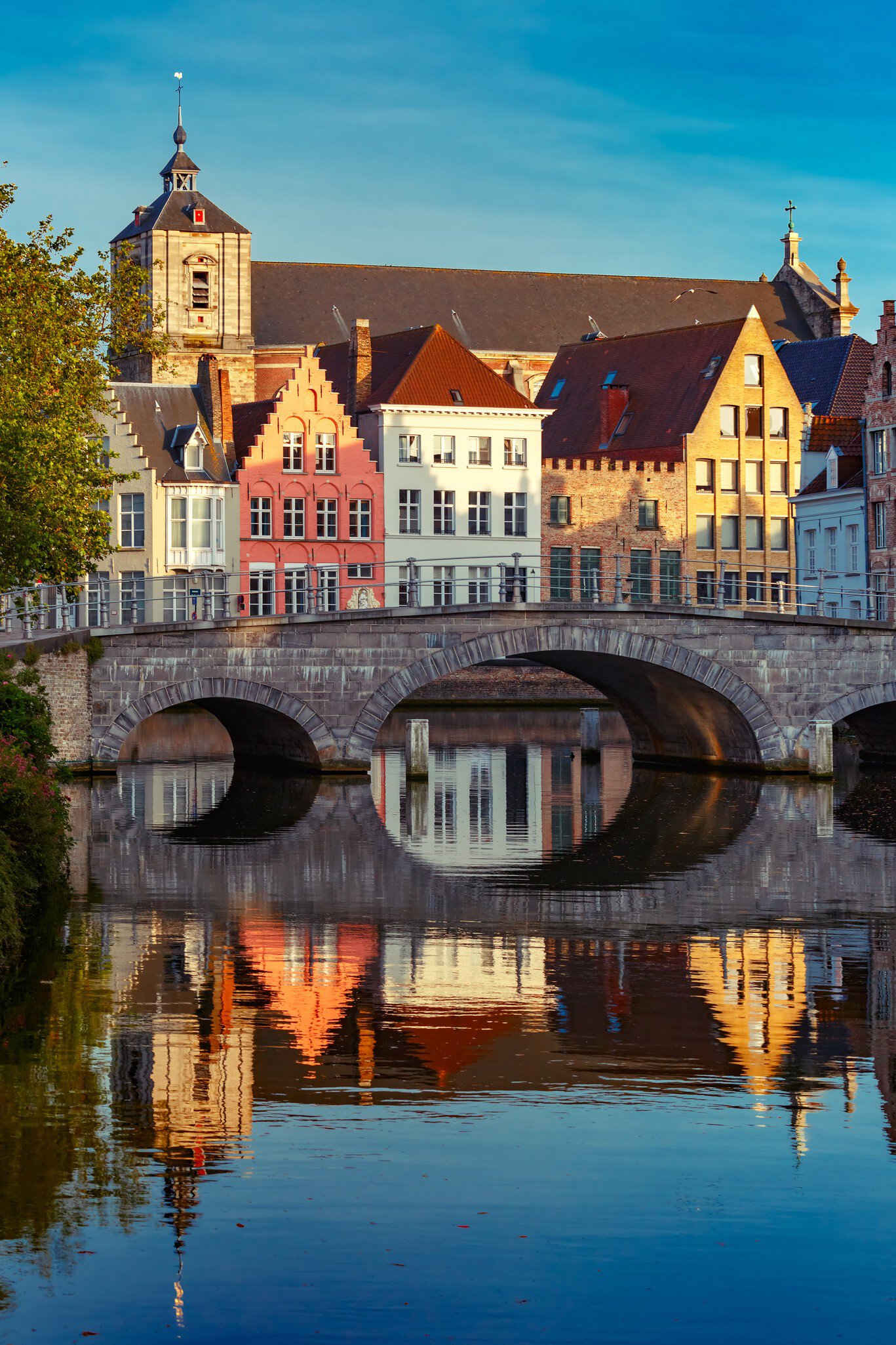 GettyImages-1001735770.jpg
Scenic city view of Bruges canal with beautiful medieval colored houses, bridge and reflections in the evening gold hour, Belgium
Night Bruges canal and bridge, Belgium