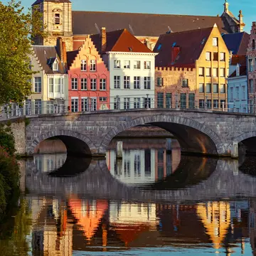 GettyImages-1001735770.jpg
Scenic city view of Bruges canal with beautiful medieval colored houses, bridge and reflections in the evening gold hour, Belgium
Night Bruges canal and bridge, Belgium