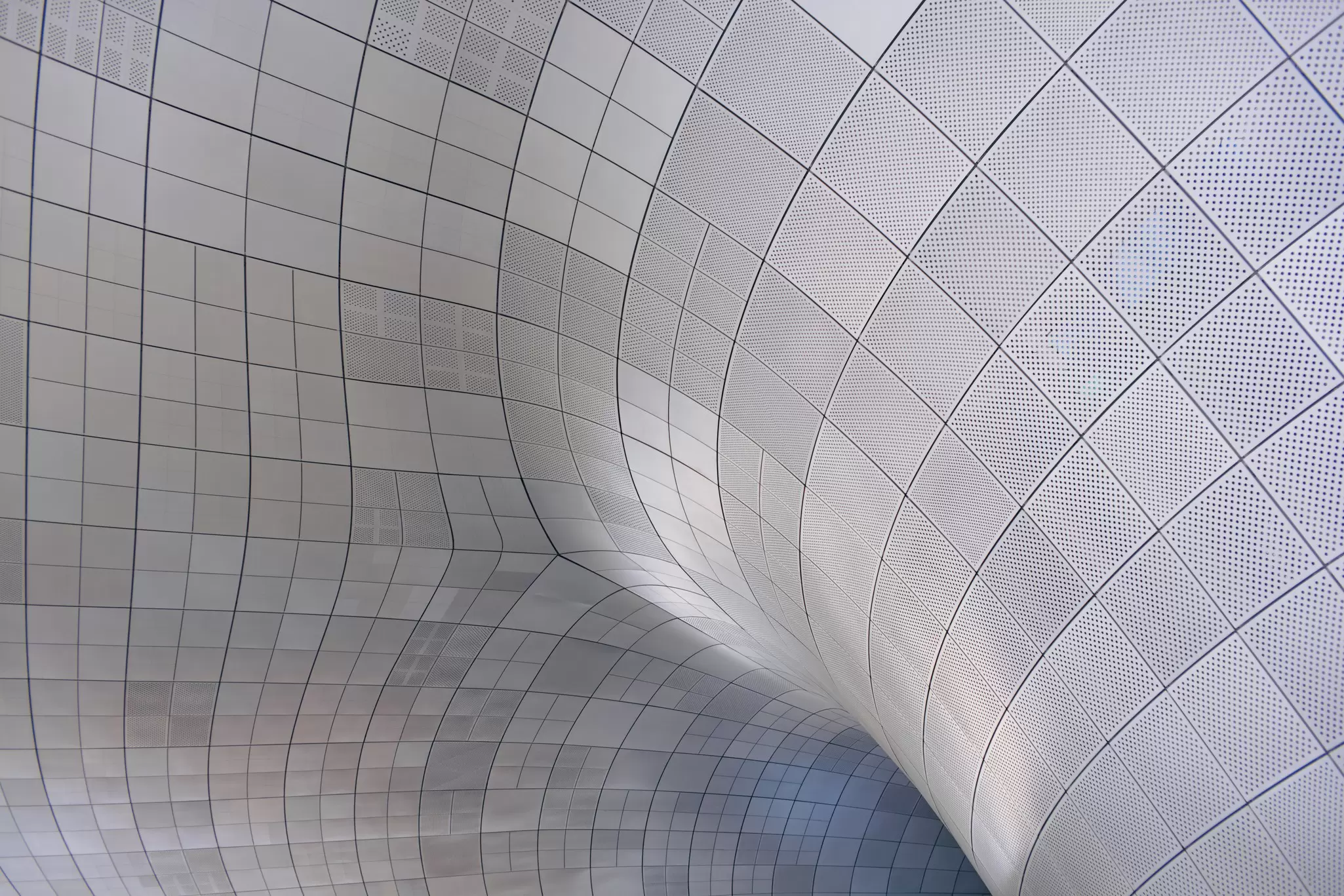 White tiles on a curved structure.