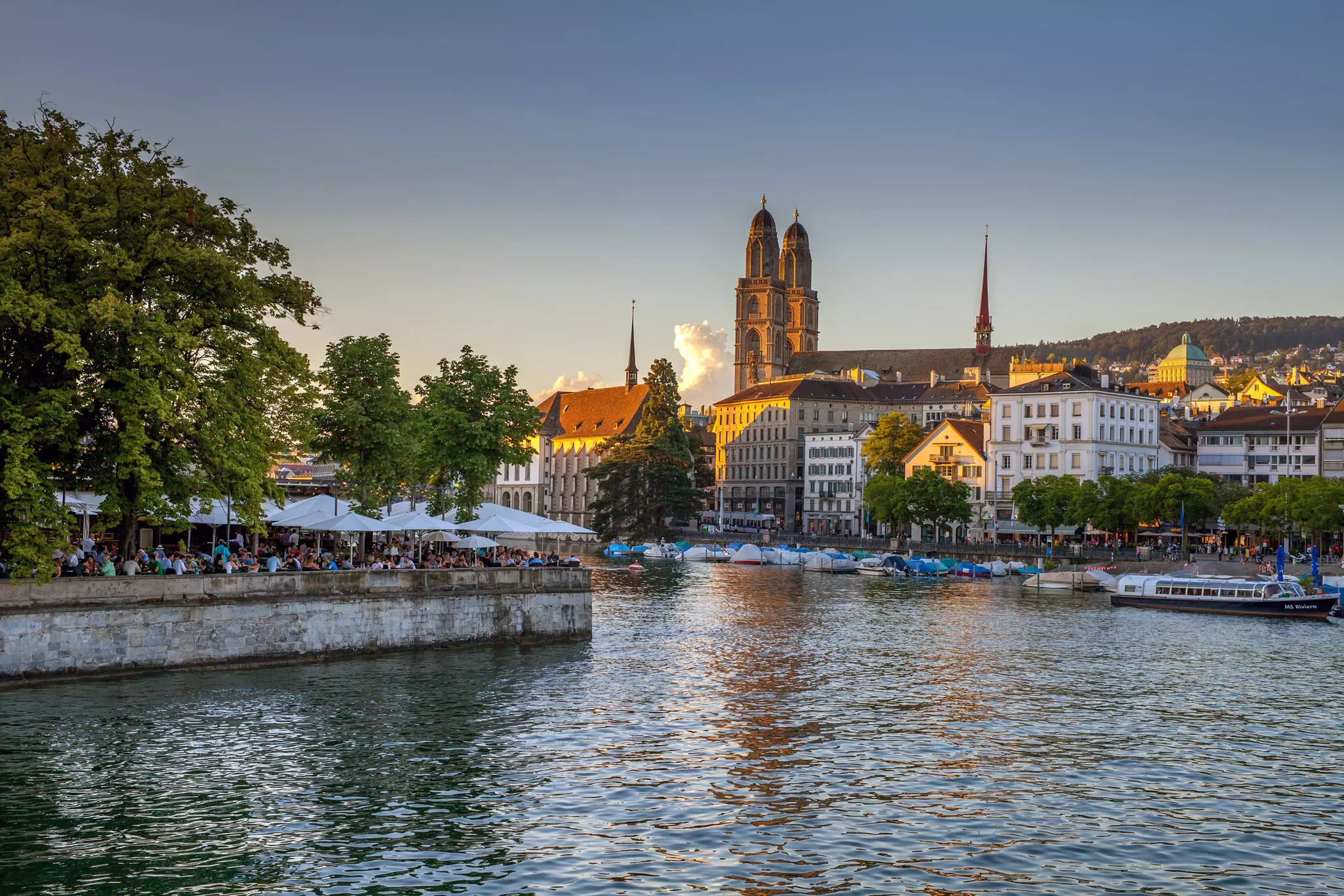 An iconic Limmat river view with Fraumünster and Grossmünster in the distance © Kirill Rudenko / Getty Images