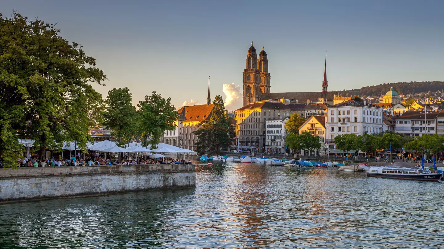 An iconic Limmat river view with Fraumünster and Grossmünster in the distance © Kirill Rudenko / Getty Images