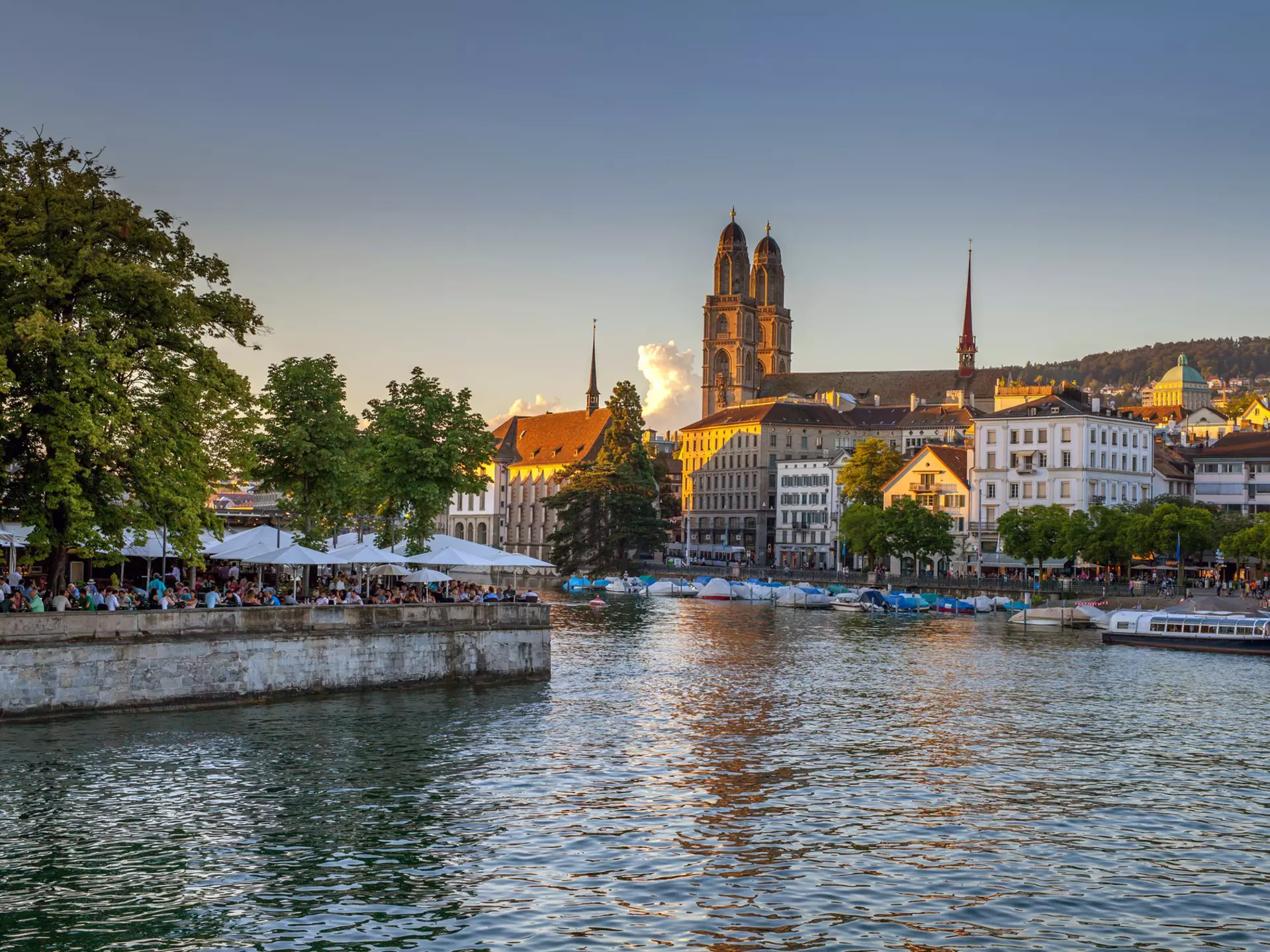 An iconic Limmat river view with Fraumünster and Grossmünster in the distance © Kirill Rudenko / Getty Images