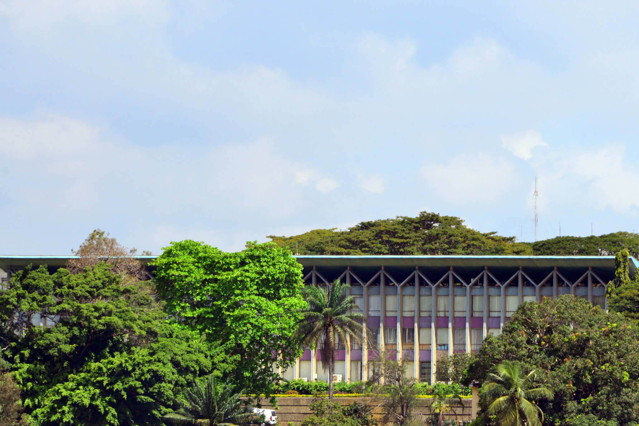 Abidjan, Ivory Coast / Côte d'Ivoire: completed in 1961, the presidential palace of Abidjan was designed by the French architect Pierre Dufau, and paid by the French Republic - Plateau district.