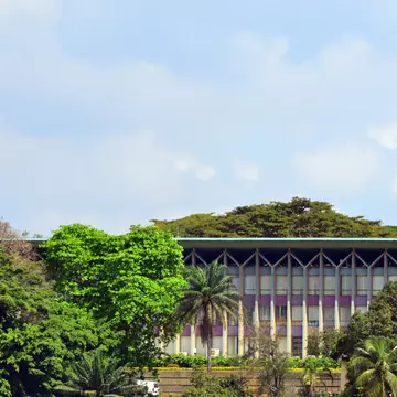 Abidjan, Ivory Coast / Côte d'Ivoire: completed in 1961, the presidential palace of Abidjan was designed by the French architect Pierre Dufau, and paid by the French Republic - Plateau district.