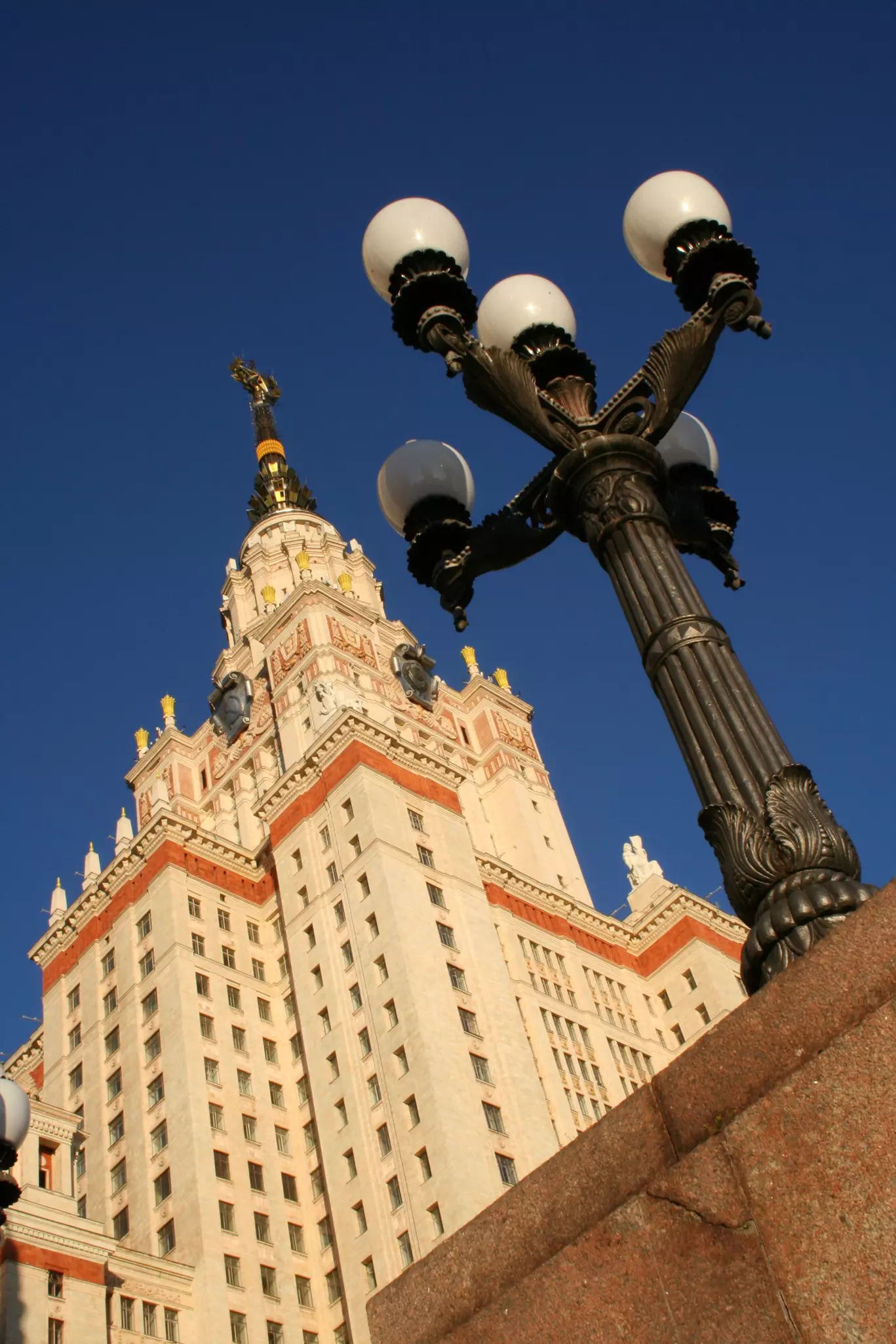 Three ornate gold and trellis doors, entrances to the Dorchester Grill in London