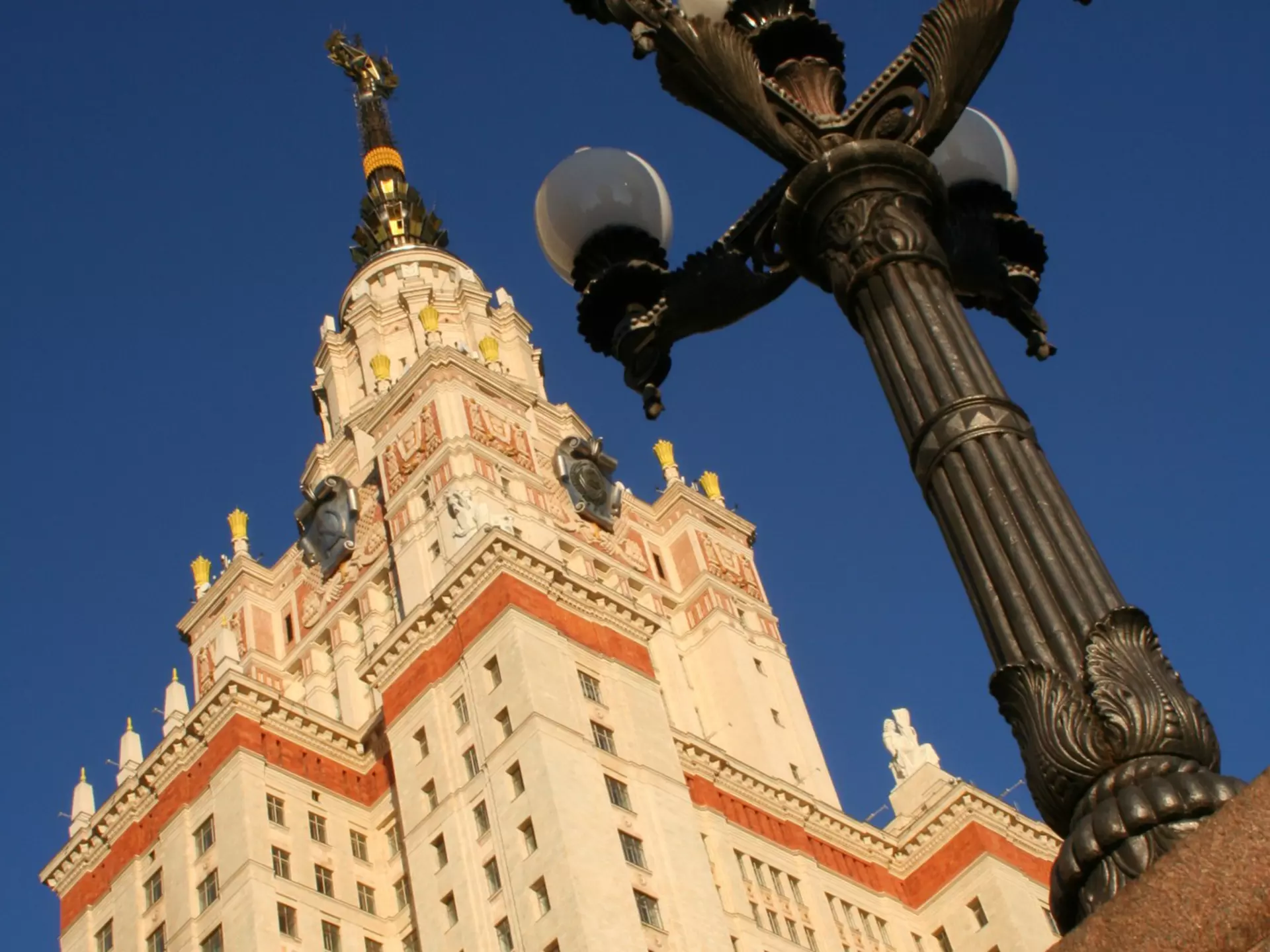 Three ornate gold and trellis doors, entrances to the Dorchester Grill in London