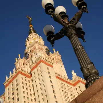 Three ornate gold and trellis doors, entrances to the Dorchester Grill in London