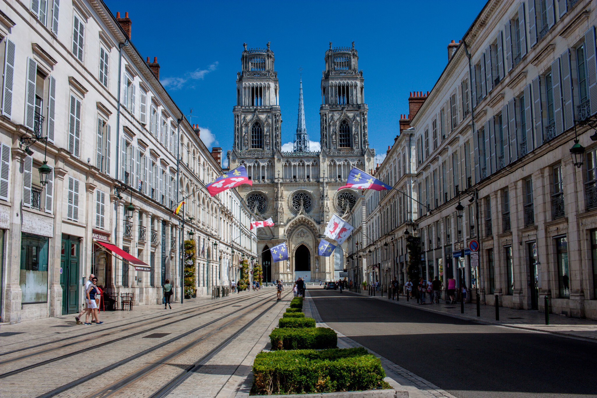 Orléans, France - August 17, 2018: Cathédrale Sainte-Croix rises up above Rue Jeanne d'Arc