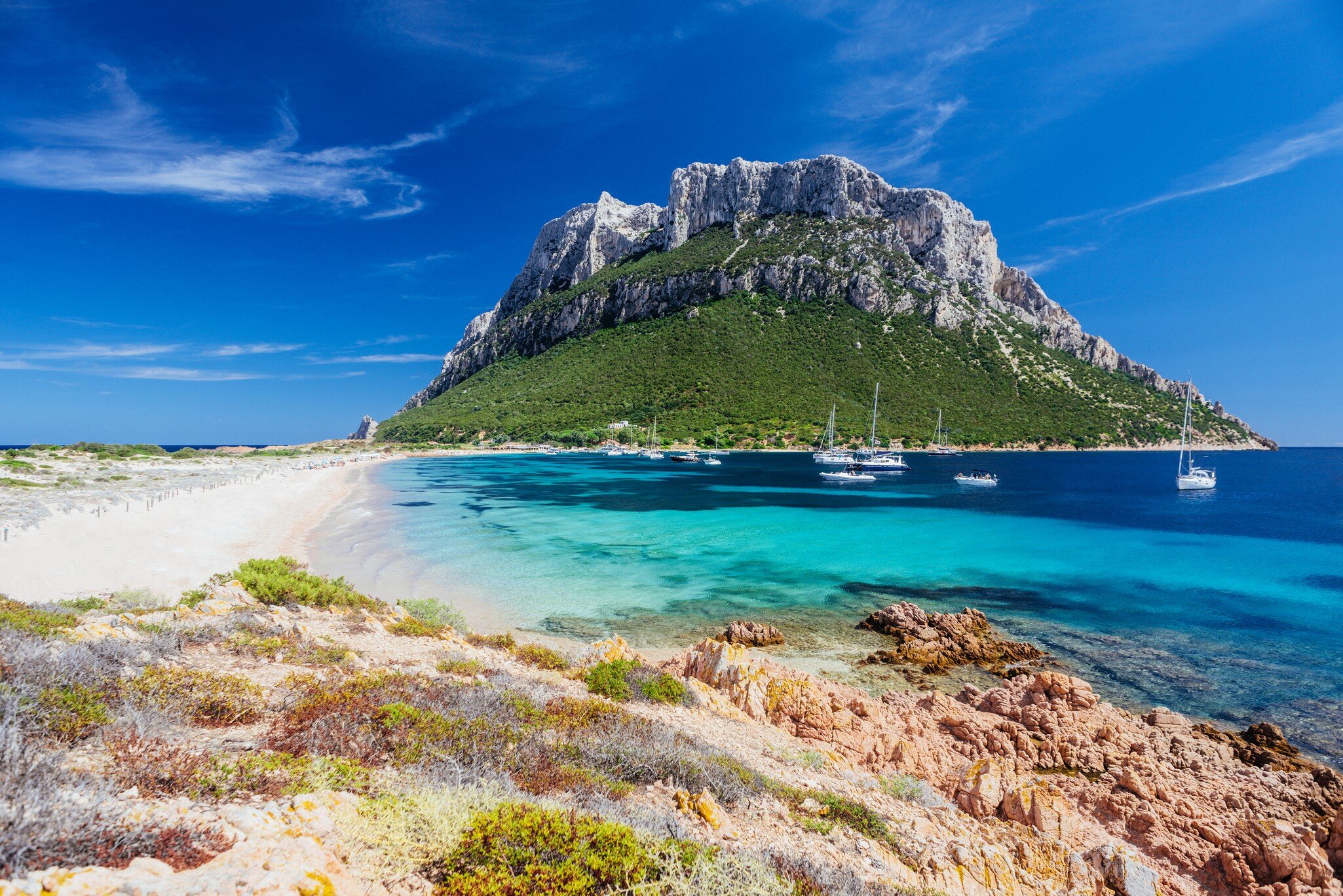 Scenic landscape of the crystal clear waters of the main beach in Tavolara Island, in front of Olbia, Sardinia.; Shutterstock ID 1824036629;