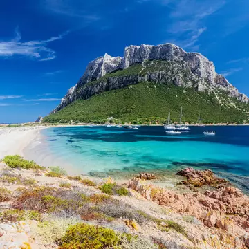 Scenic landscape of the crystal clear waters of the main beach in Tavolara Island, in front of Olbia, Sardinia.; Shutterstock ID 1824036629;