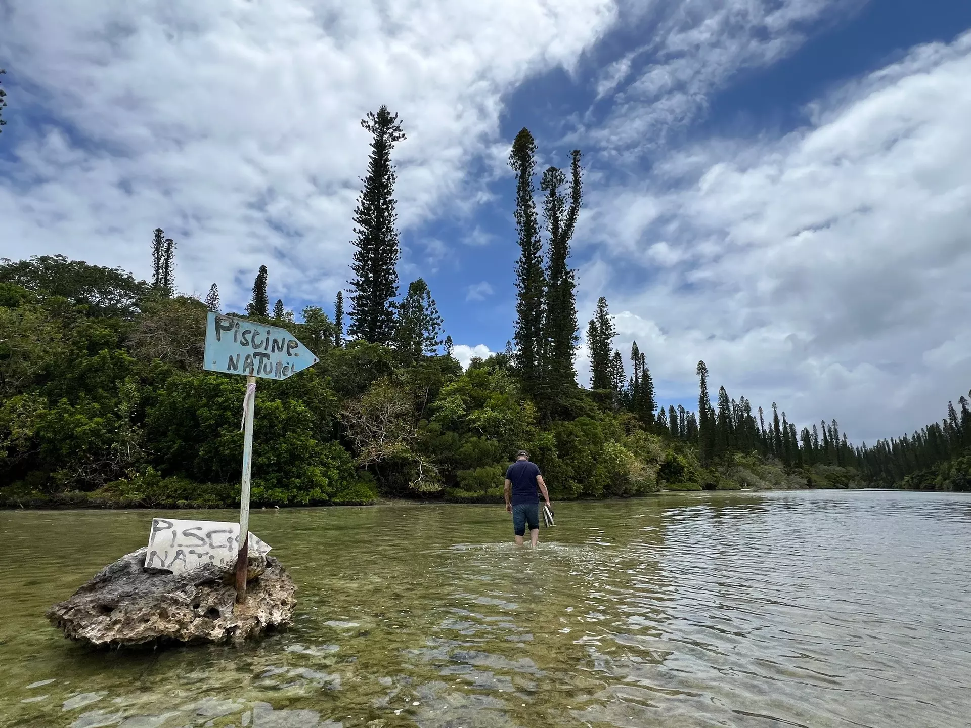 ÎLES DES PINS, NEW CALEDONIA, DECEMBER 2025. Walking to the Natural Swimming Pool on the Isle of Pines.