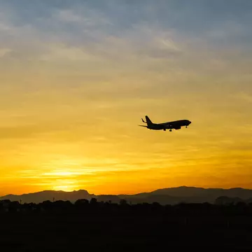 Air travel is not the greenest option, but often it's the quickest and cheapest. D-Stocker / Shutterstock
