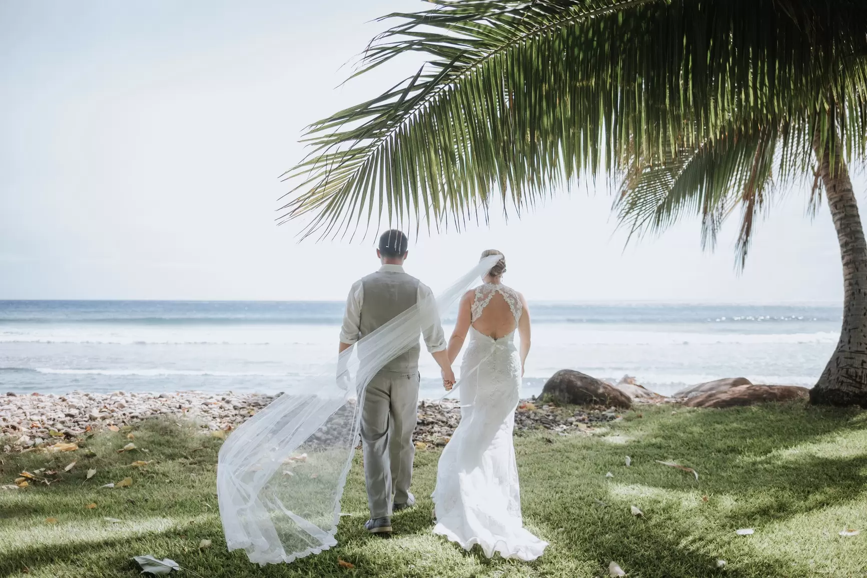 If you’re invited to a wedding in the Caribbean during the summer/fall hurricane season, you don’t need to fret about accepting © Leah Flores / Stocksy