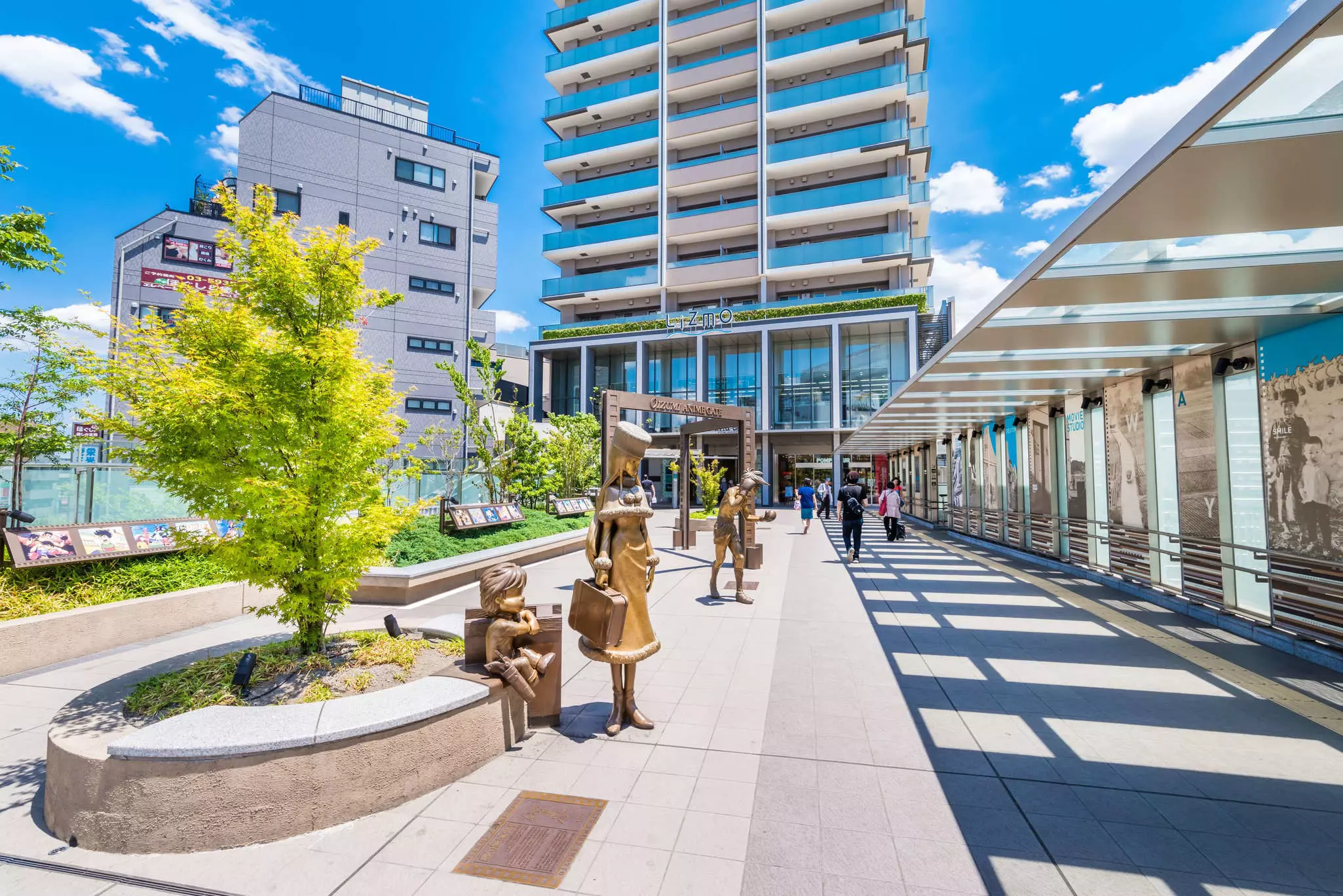 NERIMA, TOKYO / JAPAN - JUNE 5 2017 : "Oizumi Anime Gate" in front of "Oizumi Gakuen" station. A bronze statue of an animated work is displayed. "Oizumi" is the birthplace of Japanese animation.
city, building, urban, high rise, condo, housing, person,...