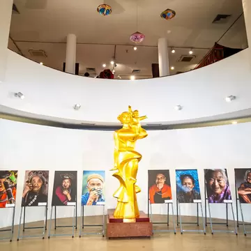 A golden statue of 'Me Viet Nam' in the Vietnamese Women's Museum in Hanoi.
