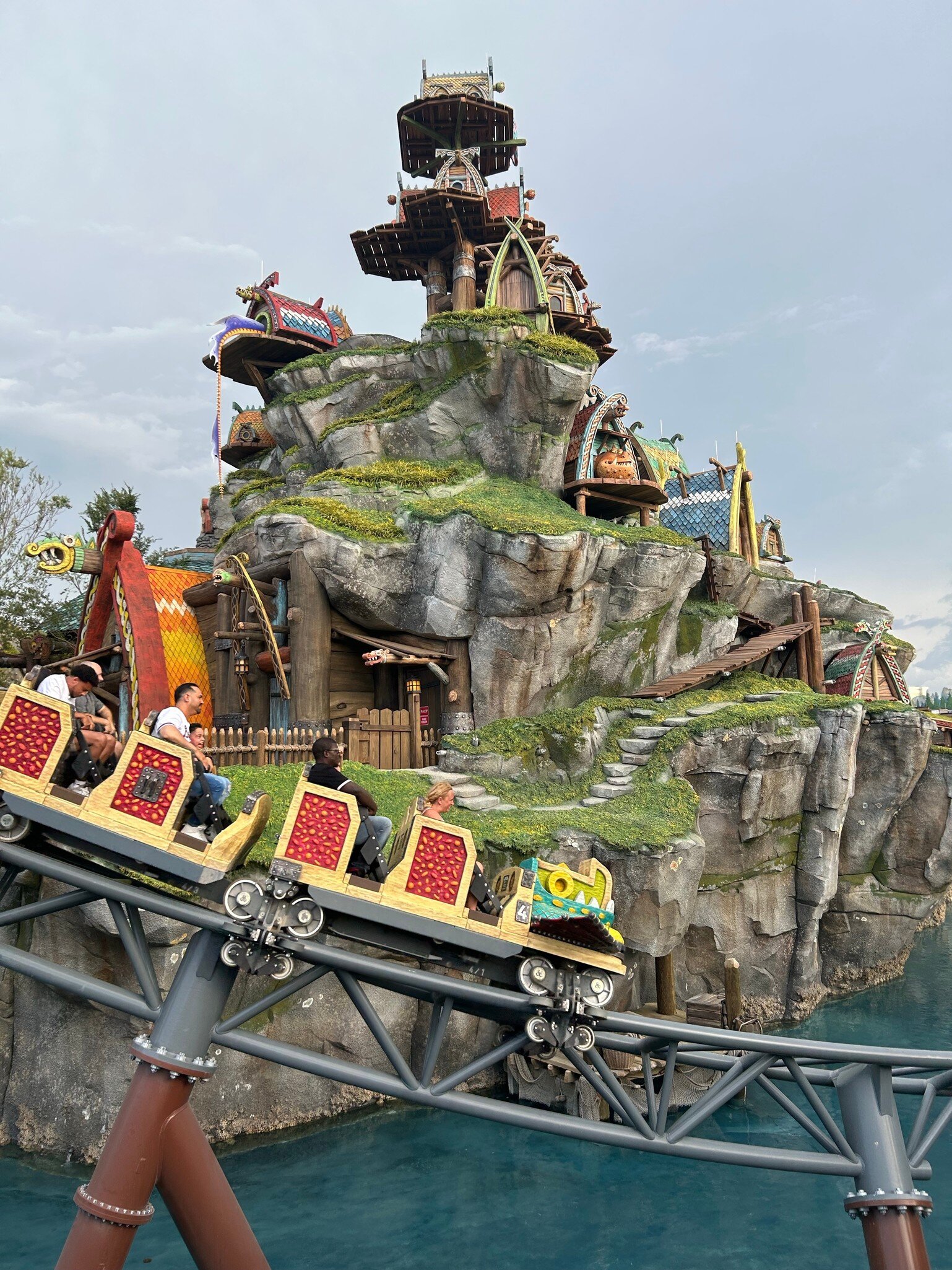 View of people on the Hiccup’s Wing Gliders ride at Universal Epic Universe in Orlando, Florida.