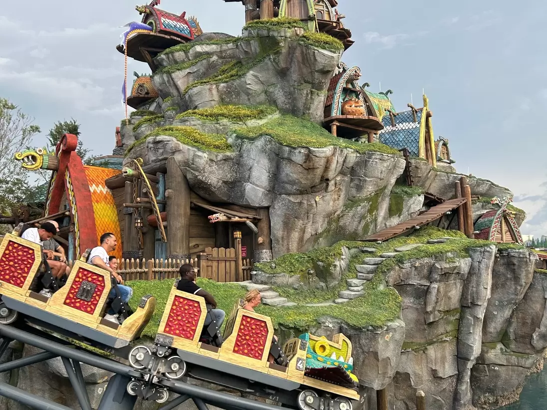View of people on the Hiccup’s Wing Gliders ride at Universal Epic Universe in Orlando, Florida.