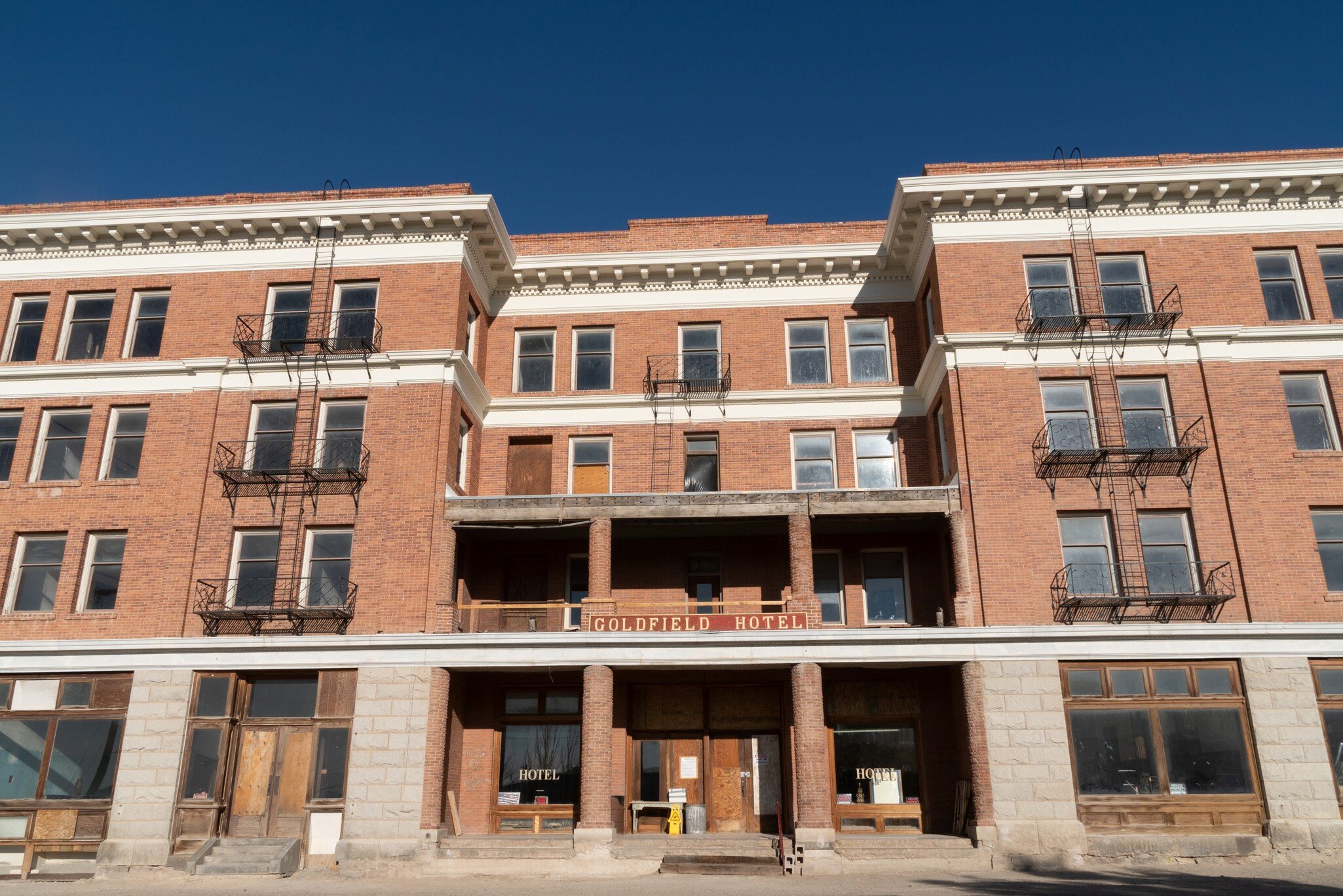 Goldfield, Nevada - July 4, 2018: Exterior view of the Goldfield Hotel sign in Goldfield Nevada. The hotel is abandoned and supposedly haunted.