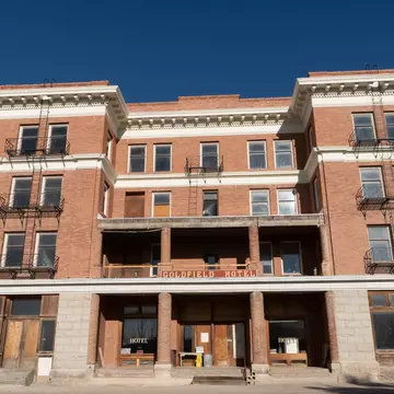 Goldfield, Nevada - July 4, 2018: Exterior view of the Goldfield Hotel sign in Goldfield Nevada. The hotel is abandoned and supposedly haunted.