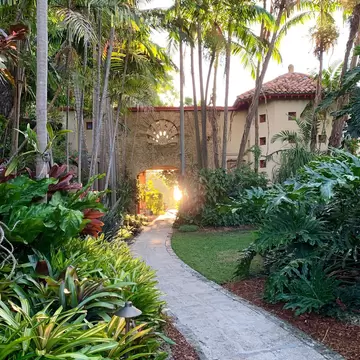 View of a path in the Kampong, one of the five gardens that make up the National Tropical Botanical Garden in Miami, Florida.