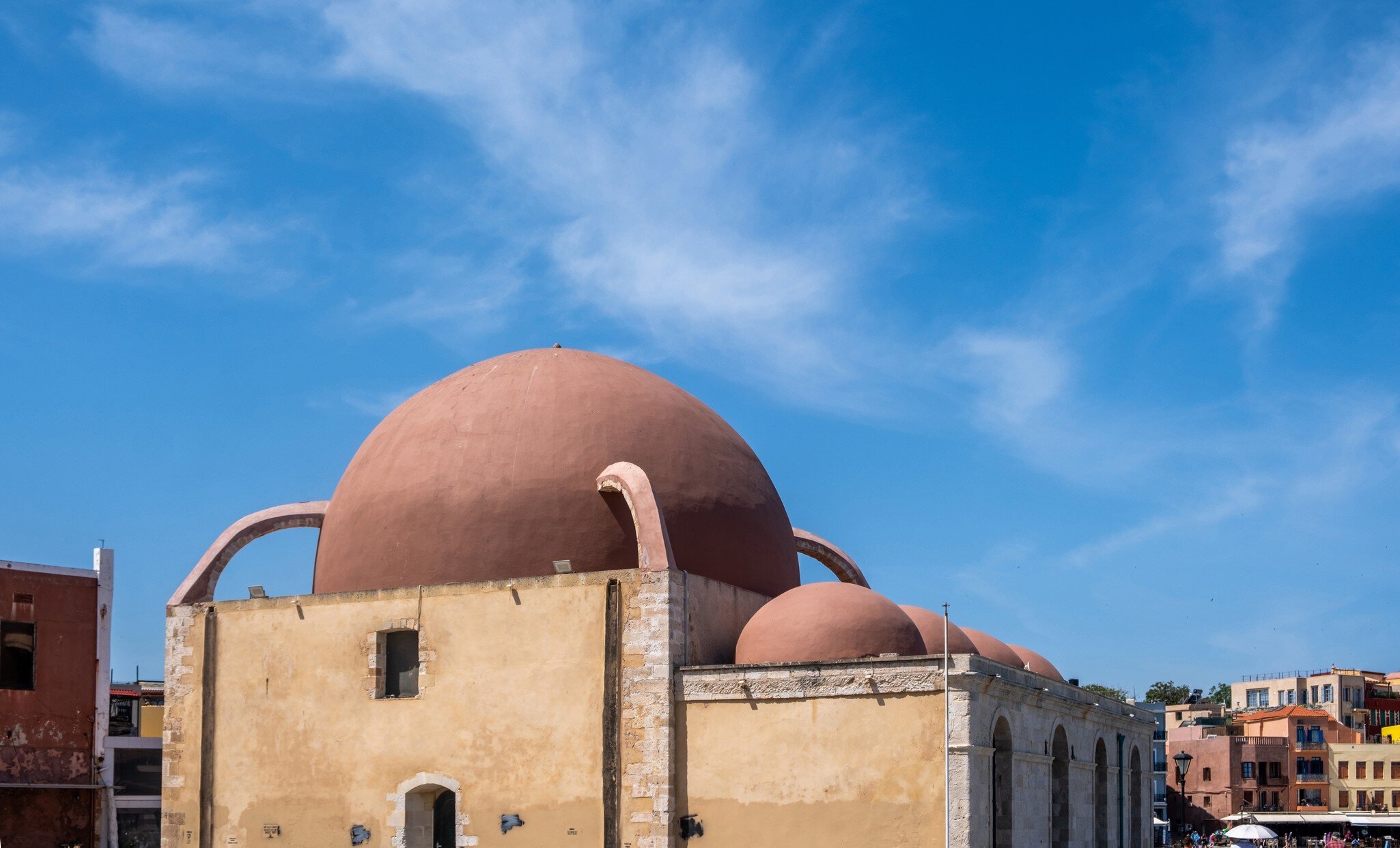The exterior of the Hassan Pascha mosque at the old Venetian harbor in Chania, Crete.