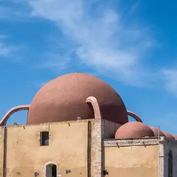 The exterior of the Hassan Pascha mosque at the old Venetian harbor in Chania, Crete.