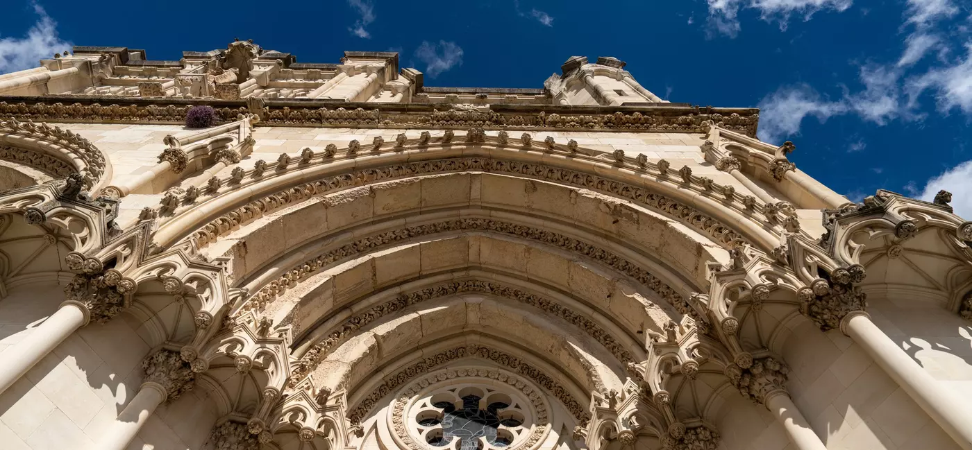 Building continued over several centuries, resulting in a mix of architectural influences.