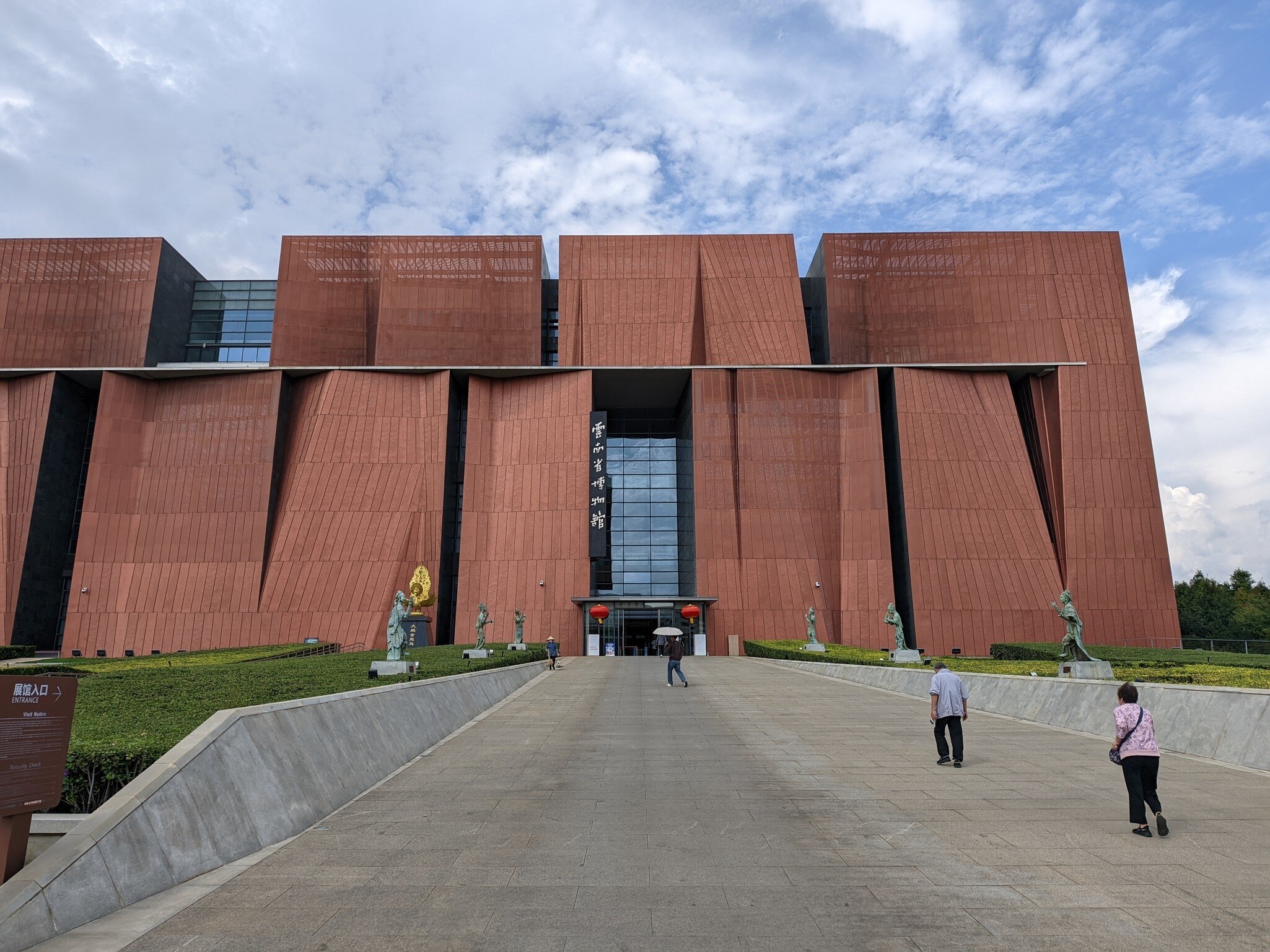 KUNMING, CHINA - OCTOBER 15, 2025: Visitors walking towards the main entrance of the Yunnan Provincial Museum under a blue sky., License Type: media, Download Time: 2026-09-02T17:22:06.000Z, User: LP_NZhan, Editorial: true, purchase_order: 65050 - Digital Destinations and Articles, job: App Content, client: Lonely Planet App, other: Nadine Zhan 