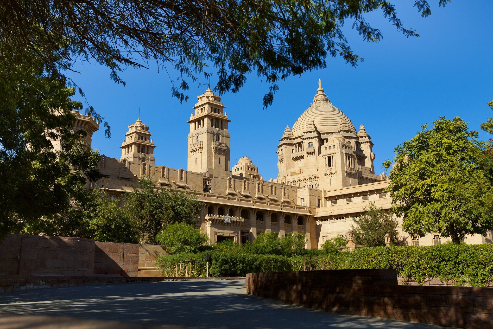 Facade of Umaid Bhawan Palace from the garden, Jodhpur, India.