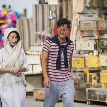 Tourists tour the old market of Souk Waqif, Doha, Qatar, Middle East