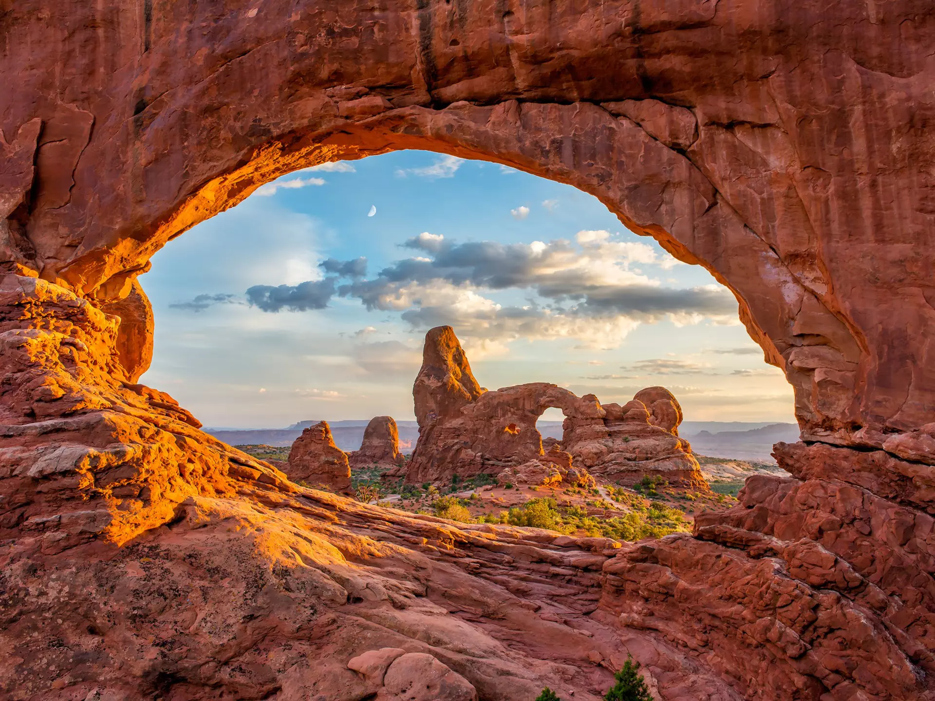 Turret arch through the North Window at Arches National Park in Utah. anthony heflin/Shutterstock