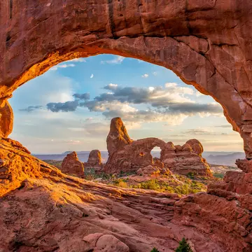 Turret arch through the North Window at Arches National Park in Utah. anthony heflin/Shutterstock