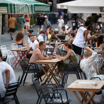 For many people, solo dining is a real treat - but has Barcelona banned the tradition? © Getty Images