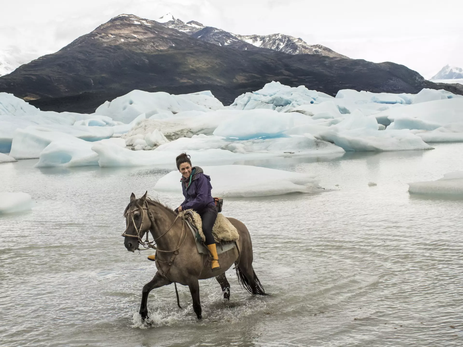 Adventurous woman, outdoor woman, friend, guide, Badass, strong, happy, content, risk taker, whole/complete, competent
1126695765
chile, january, horse, portrait, women, one woman only, one person, mare, patagonia - chile, photography, chilean ethnicity, latin america, latin american and hispanic ethnicity, 30-39 years, 35-39 years, people, adult, horseback riding, nature, riding, animal, rustic, riding tack, halter, saddle, sheepskin, mountain, getting away from it all, south america, journey, non-urban scene, one animal, outdoors, lake, water, iceberg - ice formation, glacier, mountain range, cold temperature, glacier lagoon, extreme terrain, One Person
