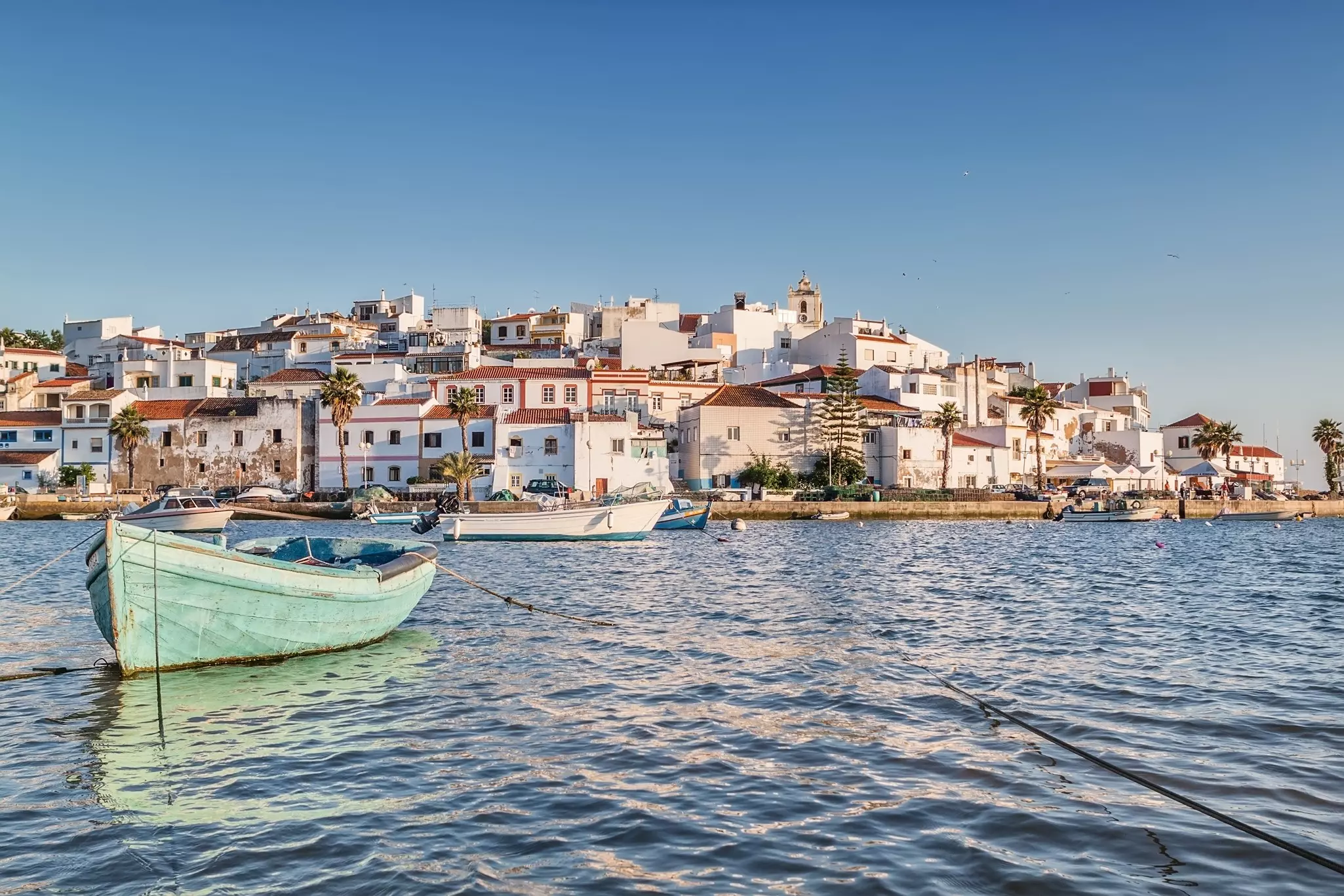 Old sea town of Ferragudo with a boat in the foreground