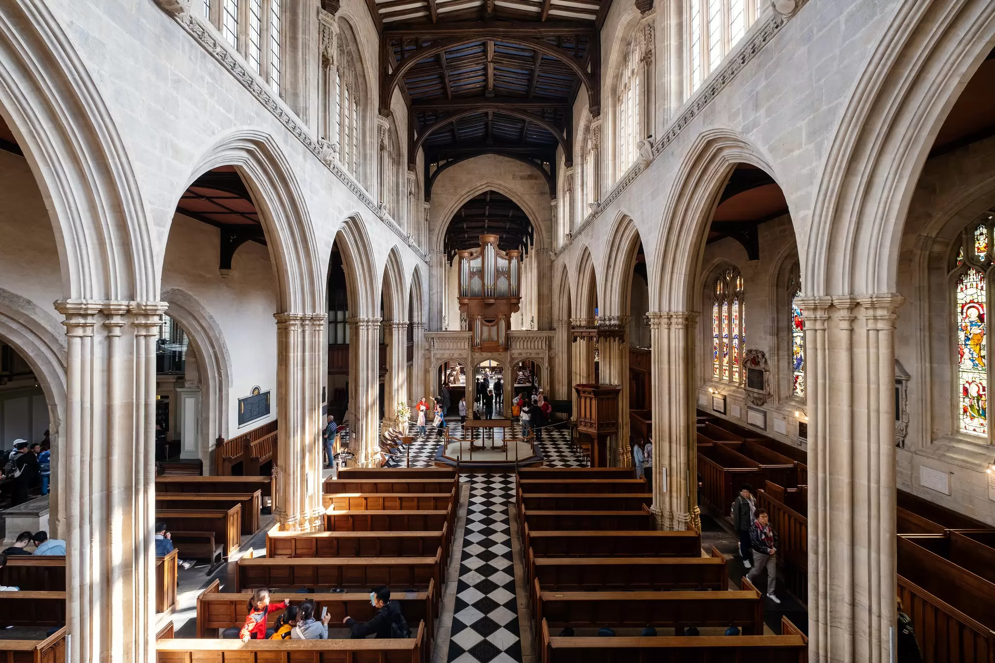 View down the nave of University Church of St Mary the Virgin in Oxford, UK.