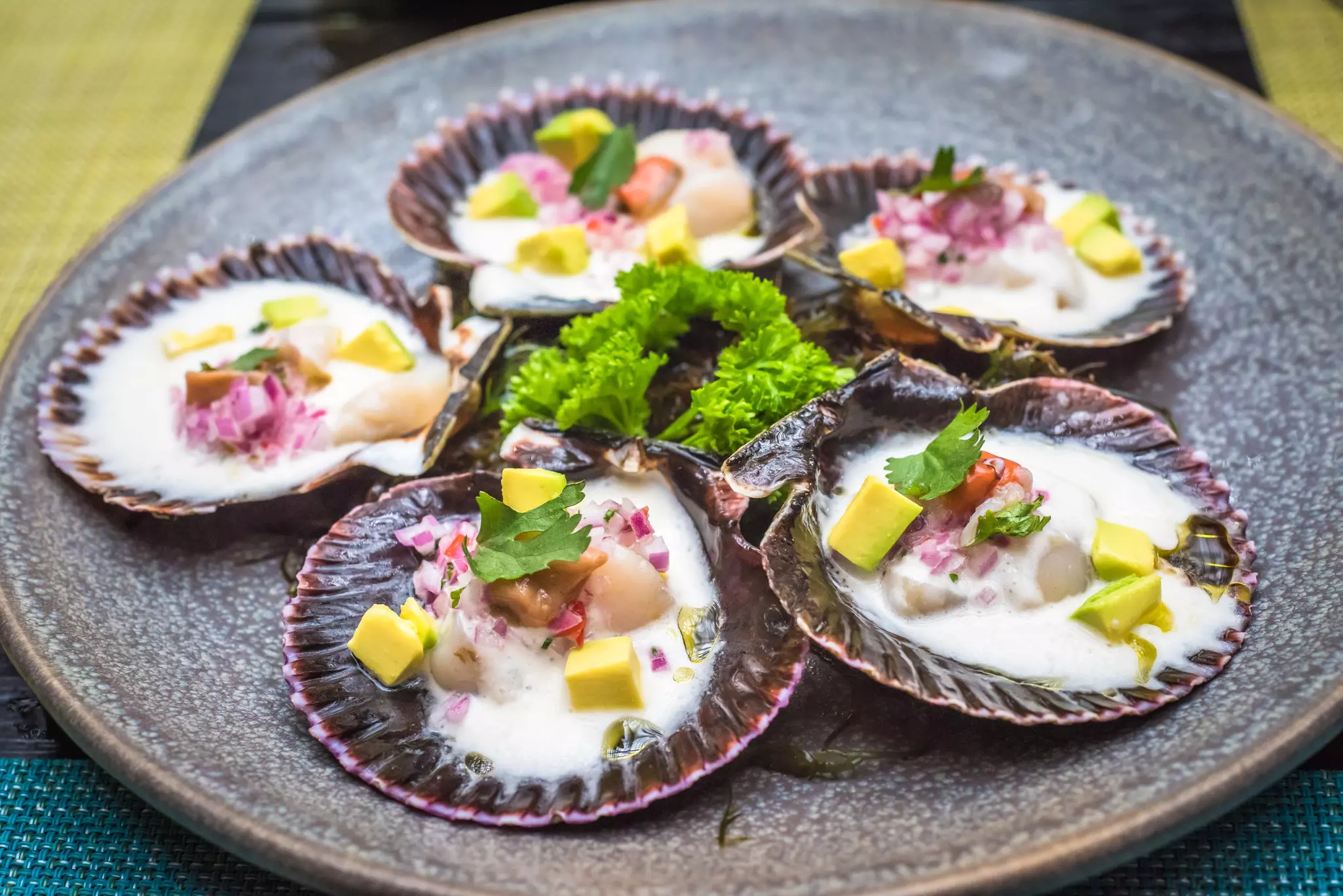 Fresh scallops, Peruvian style, on a plate