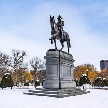 The equestrian statue of George Washington in Boston Public Garden in winter. Chalermpon Poungpeth/Shutterstock