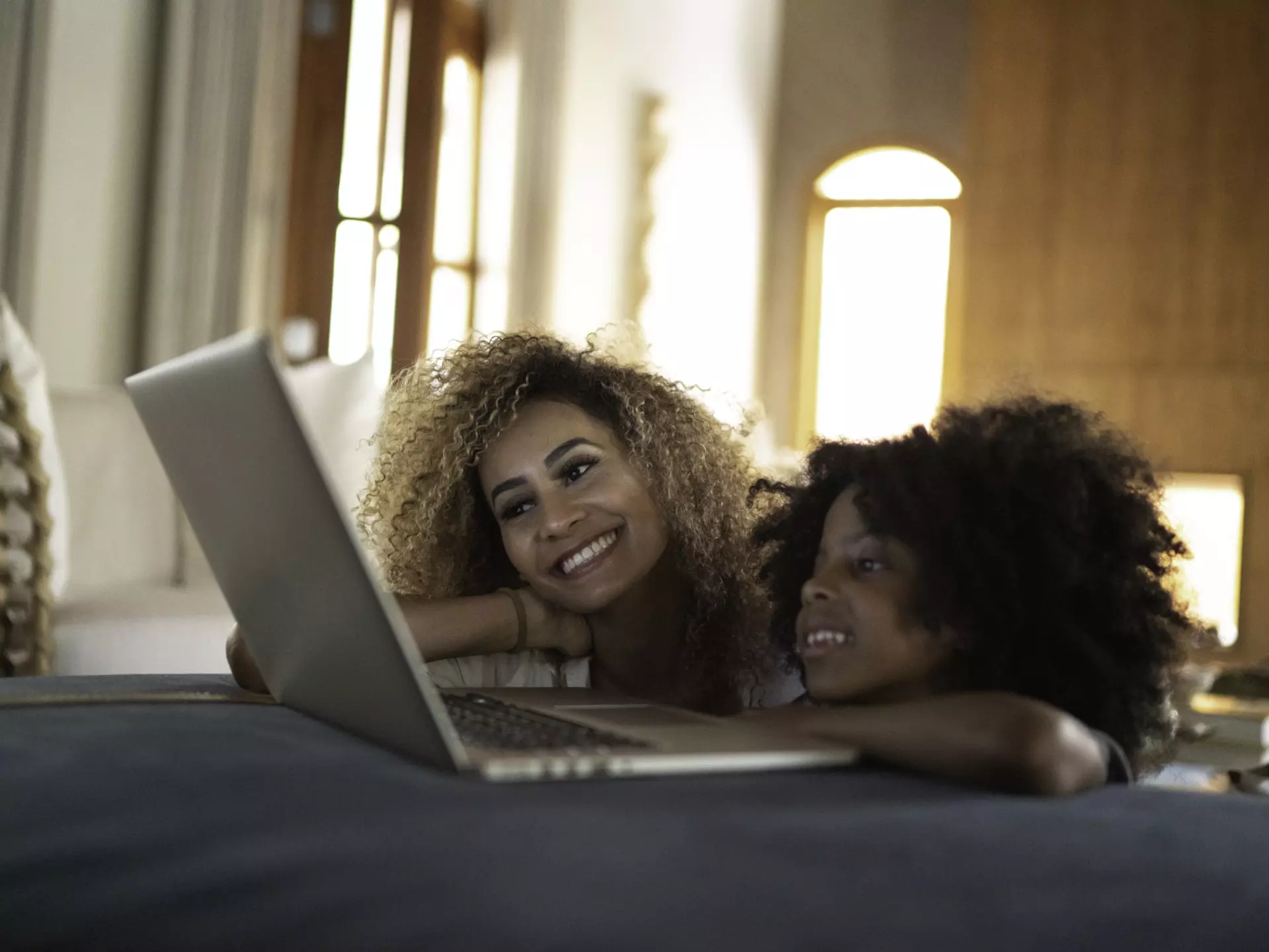 Single mother and daughter watching movie on a laptop
1182449214
Simple Living, Enjoyment, Technology, Mid Adult, Connection, Two, Two People, Real Life, Females, Home Interior, Domestic Life, Television Show, Mother, Downloading, Watching TV, House, 30-34 Years, Computer, Togetherness, Daughter, Using Laptop, Real People, Leisure Activity, Playful, Family with One Child, African Ethnicity, People, Watching, Toothy Smile, Relaxation, Horizontal, Child, Affectionate, Multi-Ethnic Group, Using Computer, Latin American and Hispanic Ethnicity, Lying Down, Fun, Photography, Mid Adult Women, Happiness, Internet, Women, Digital Native, Brazilian Ethnicity, Indoors, Single Mother, 4-5 Years, Brazil, Candid, Childhood, Laptop, Movie, Family, Broadcasting, Weekend Activities, Adult, Afro, Copy Space, Smiling, Modern