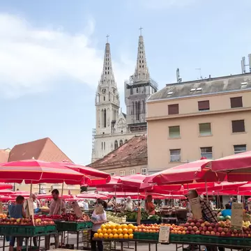 ZAGREB, CROATIA - JUNE 20, 2021: Trznica Dolac Market with its red umbrellas. Dolac is the main farmers market of the Gornji grad district of the city center of the croatian capital., License Type: media, Download Time: 2026-02-04T20:46:25.000Z, User: LP_YKhanna, Editorial: true, purchase_order: 65050 - Digital Destinations and Articles, job: LP, client: App Content, other: Yuvraj Khanna