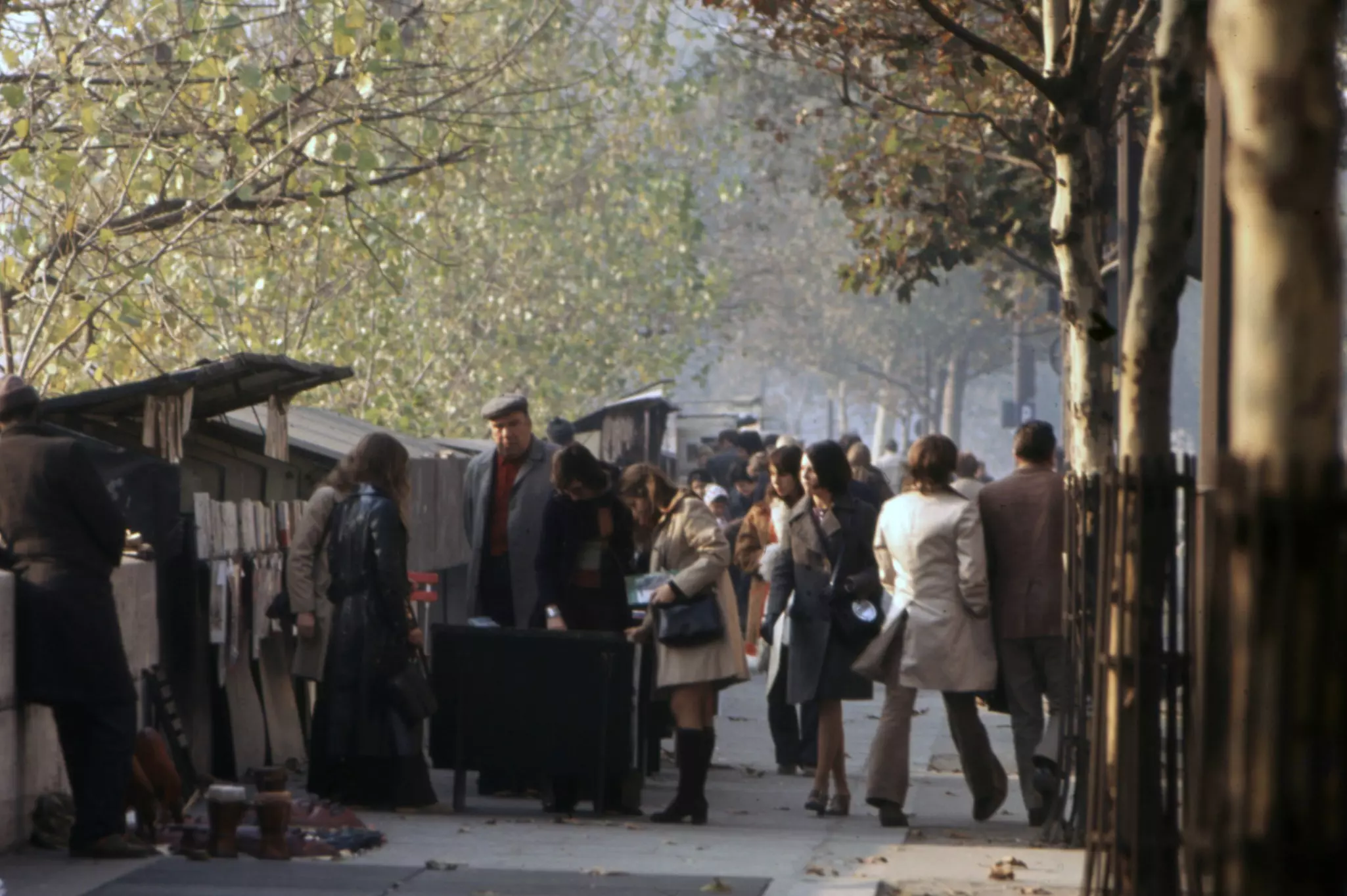 Browsing for books by the Seine in autumn in Paris 1970 (Photo by Charles Ciccione/Gamma-Rapho/Getty Images