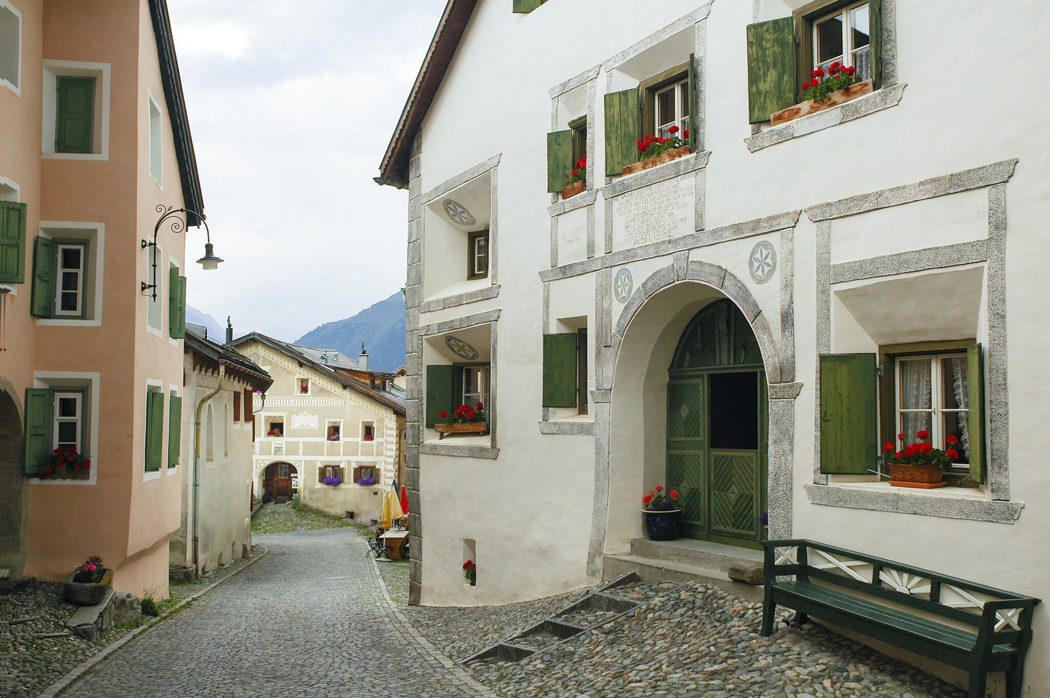 Guarda, typical village in Engadine (Graubunden, Switzerland): old houses with flowers; Shutterstock ID 190062974;