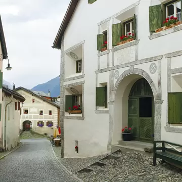 Guarda, typical village in Engadine (Graubunden, Switzerland): old houses with flowers; Shutterstock ID 190062974;