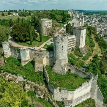 Aerial view of Fort du Coudray, Chinon castle's westernmost enclosure separated by a dry moat from the middle courtyard strengthened by rectangular and circular tower. Loire Valley, France.