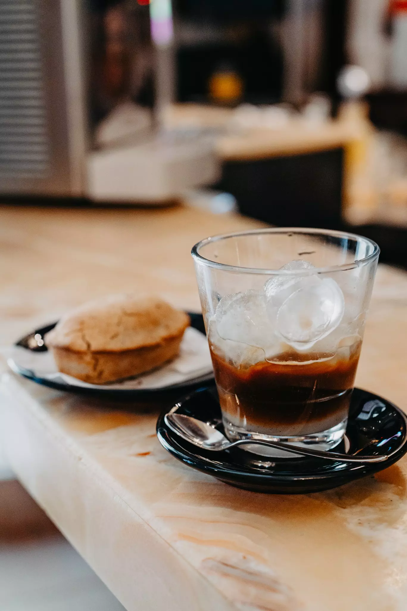 Caffe Leccese (iced coffe with almond sirup) and Pasticciotto - Caffè Alvino. August 2024: Lecce, Puglia, Italy