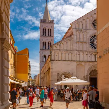View of busy street and Cathedral of St. Anastasia, Zadar, Zadar county, Dalmatia region, Croatia, Europe 1-10-19  License Type: media  Download Time: 2024-01-12T07:03:37.000Z  User: dermothegarty77  Is Editorial: Yes  purchase_order:   